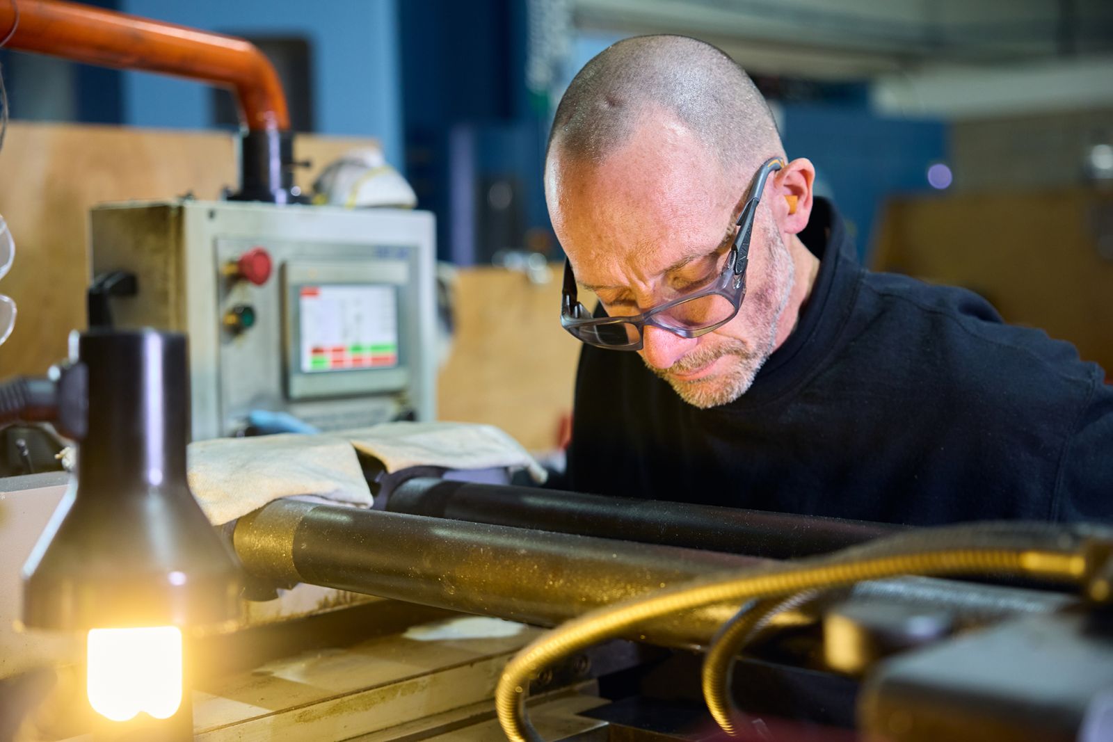 Ian using our thread roller machine